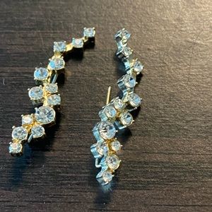 Gold tone climber earrings